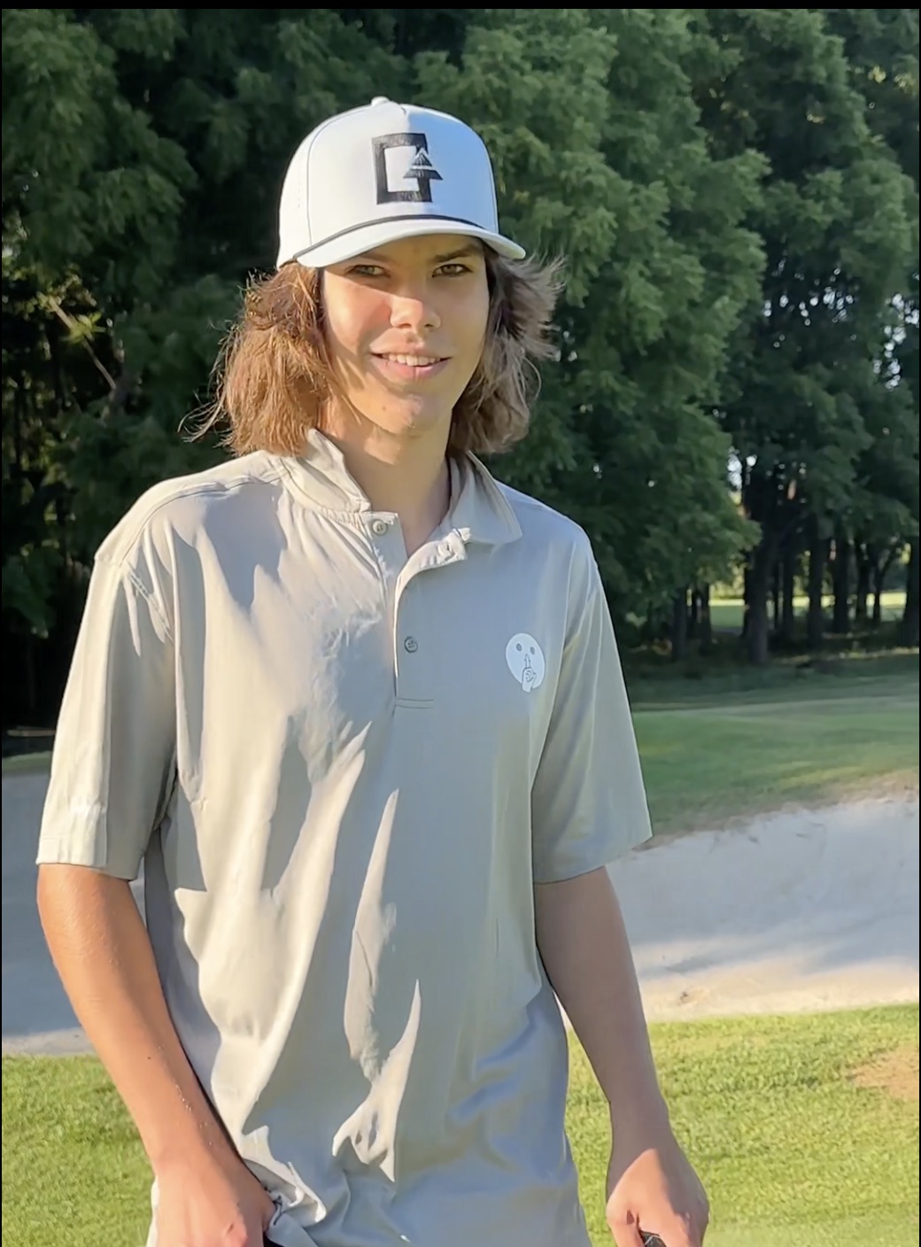 Mikhail Kirs on location at a golf course during Forest City Spotlight production