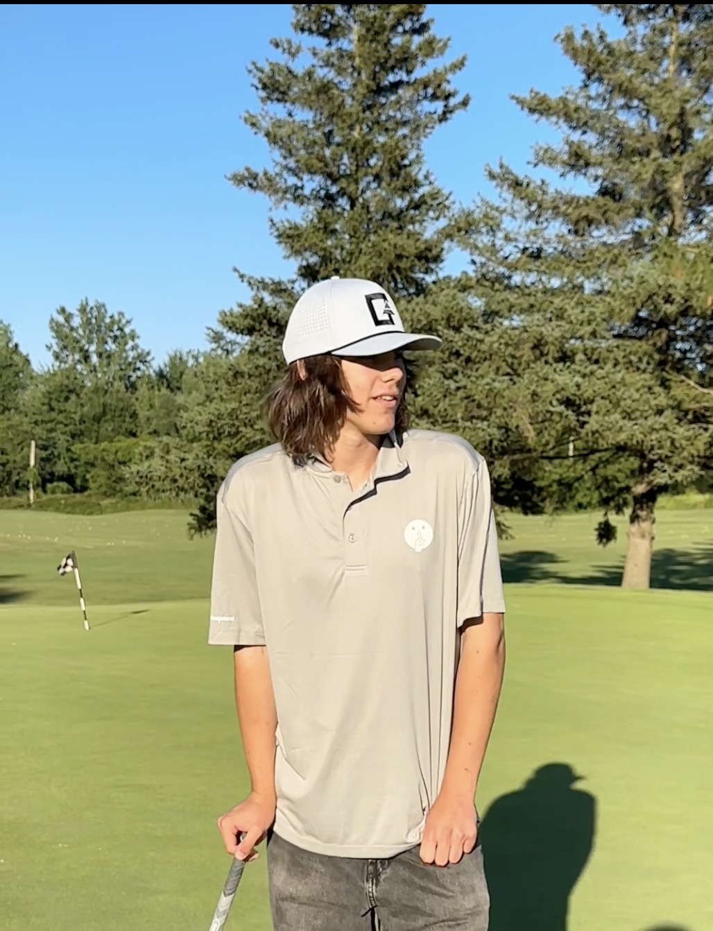 Mikhail Kirs on the golf course during a Forest City Spotlight shoot
